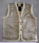 Жилет из натуральной овчины ,внешняя часть отделана плотной тканью (для эстетичного вида и практичности )