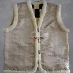 Жилет из натуральной овчины ,внешняя часть отделана плотной тканью (для эстетичного вида и практичности )