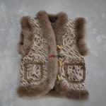 Детский жилет из натуральной овчины отделанный искусственной замшей,с накладными карманами.