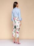 Брюки белые с цветочным принтом зауженные