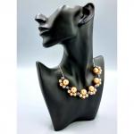 Авторское колье на цепочках из крупных и маленьких бронзовых и серых бусин