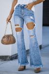 Голубые джинсы-клеш с потертостями и дырками