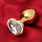 Анальная пробка Оки- Чпоки, золотая, кристалл прозрачный, в форме сердца, D = 28 мм