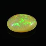 Кабошон из опала золотого овал 11*15мм