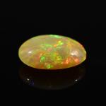 Кабошон из опала золотого овал 11*15мм