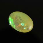 Кабошон из опала золотого овал 11*15мм