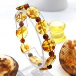 Браслет из янтаря круг 14мм цвет медовый