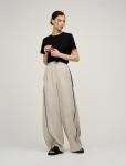 Бежевые брюки изо льна с кантами