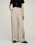 Бежевые брюки изо льна с кантами