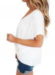 Белая блуза с драпированным узлом спереди и удлинением сзади