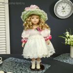 Коллекционная кукла "Малышка Антонина в нарядном платье и шляпке" 45 сме
