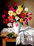 Белая ваза с разноцветными тюльпанами