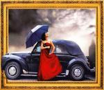 Девушка под зонтом у ретро автомобиля