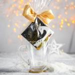 Подарочный набор «Чай исполняющий желания»: чай чёрный , апельсин с шоколадом 50 г, кружка 300 мл с подставкой