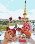 Два бокала с шампанским на фоне Эйфелевой башни