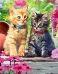 Рыжий и серый котята в цветах