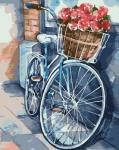 Велосипед с корзиной красных роз