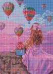Девушка в розовом платье любуется воздушными шарами