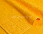 Желтое махровое полотенце (А)