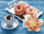 Кофе с пончиками и цветок