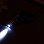 Фонарик свет+лазер на кольце "Пистолет" 2 режима  7х5х1,7 см