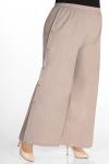 Бежевые широкие брюки из льна на резинке женские